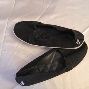 Reef black slip ons
